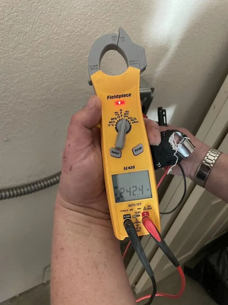 Voltage testing with clamp meter during Generator Installation in Cuero